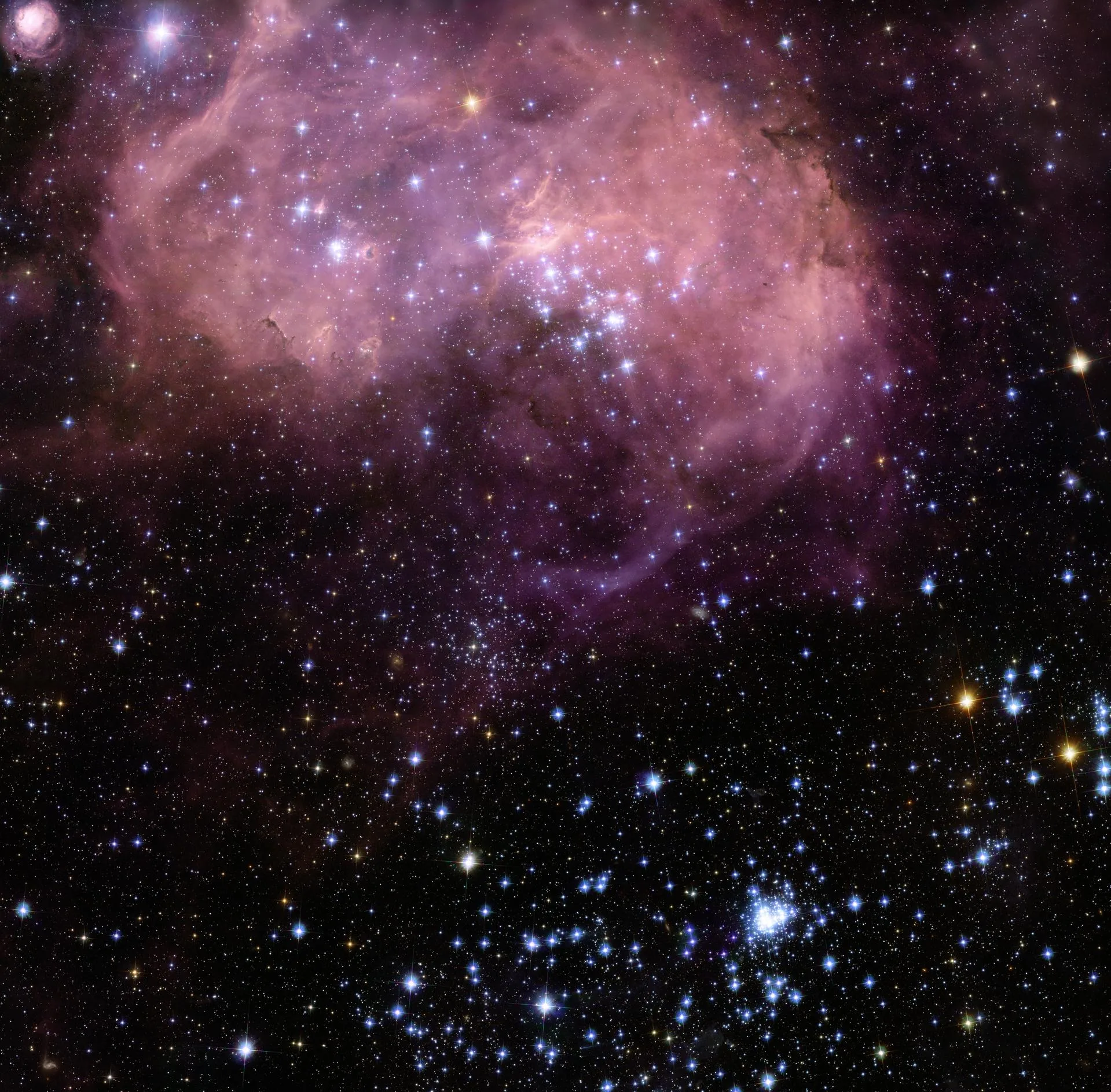 Büyük Macellan Bulutu'ndaki N11 yıldız oluşum bölgesi: Hubble'ın şimdiye kadar yayımladığı en büyük yıldız doğum bölgesi görüntülerinden biri