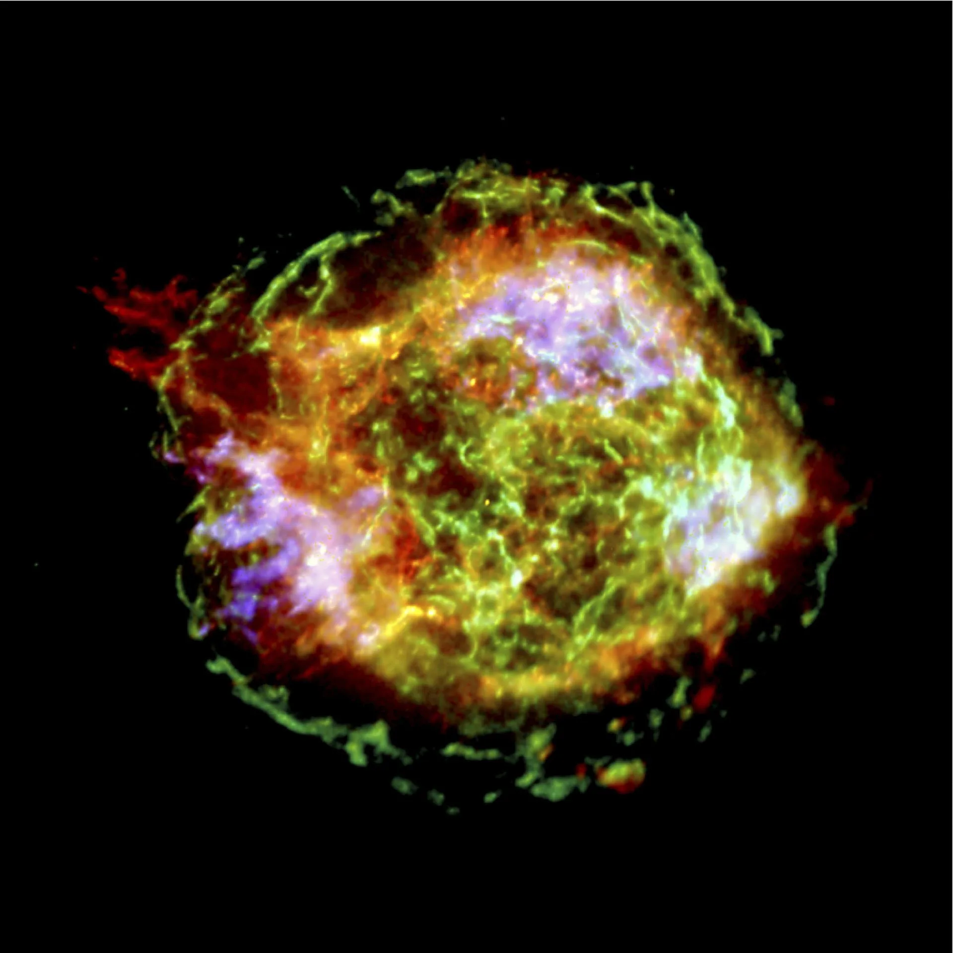 Chandra'nın bir milyon saniyelik pozla çektiği Cassiopeia A süpernova kalıntısı; dış halka şok dalgasını gösteriyor.